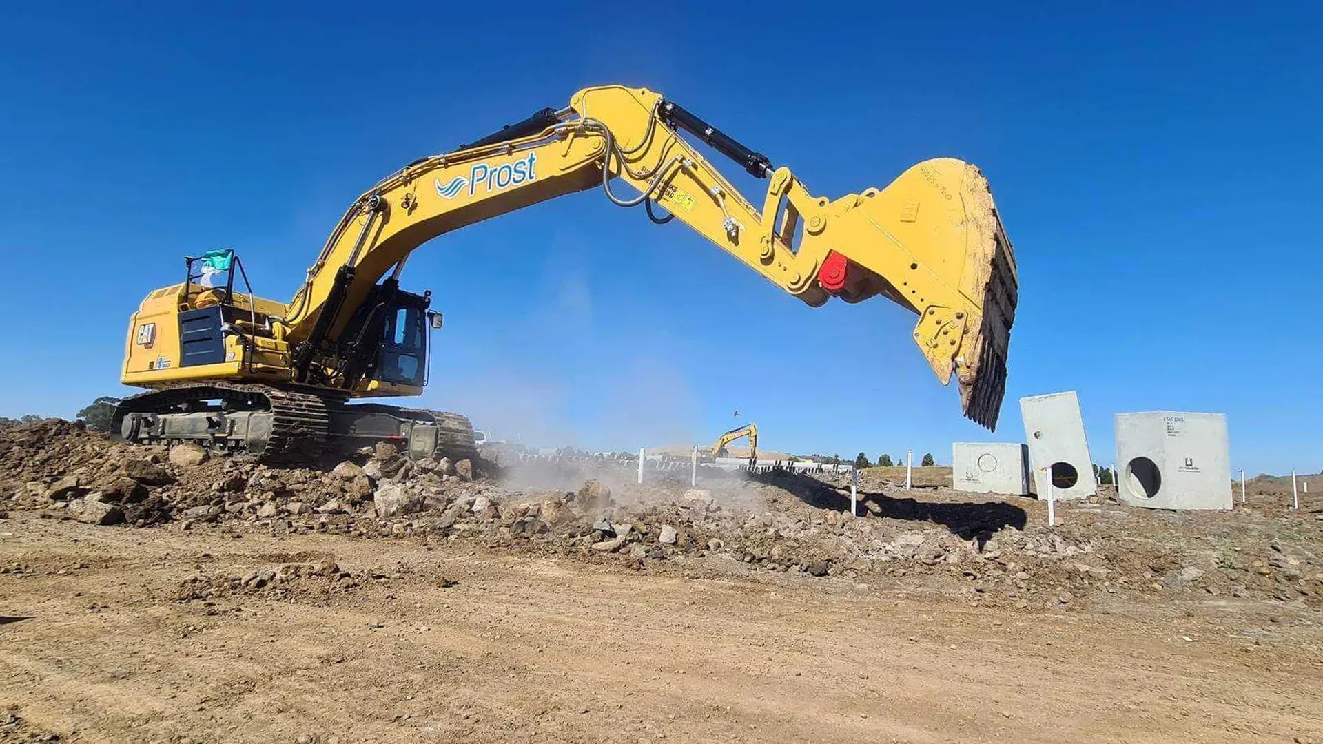 Prost Group Homepage Version 2 - Clean modern split-hero layout with rounded elements