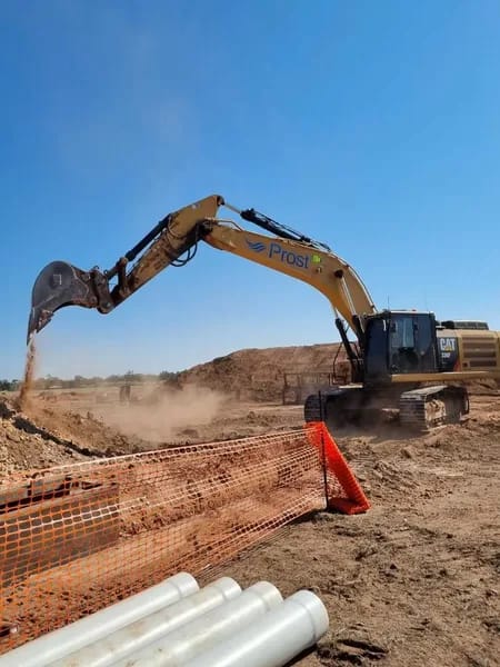 Prost Group team members on a civil construction project site